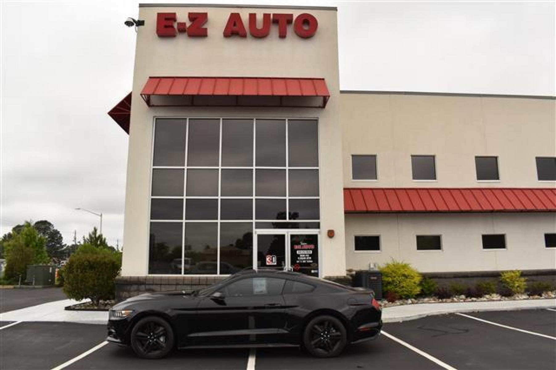 2015 Black Ford Mustang EcoBoost Premium Coupe (1FA6P8TH9F5) , 6-Speed Automatic transmission, located at 3900 Bragg Blvd., Fayetteville, NC, 28303, (910) 868-3000, 35.081905, -78.943367 - T-9527 - 2015 Ford Mustang 1FA6P8TH9F5418581 - Photo #0