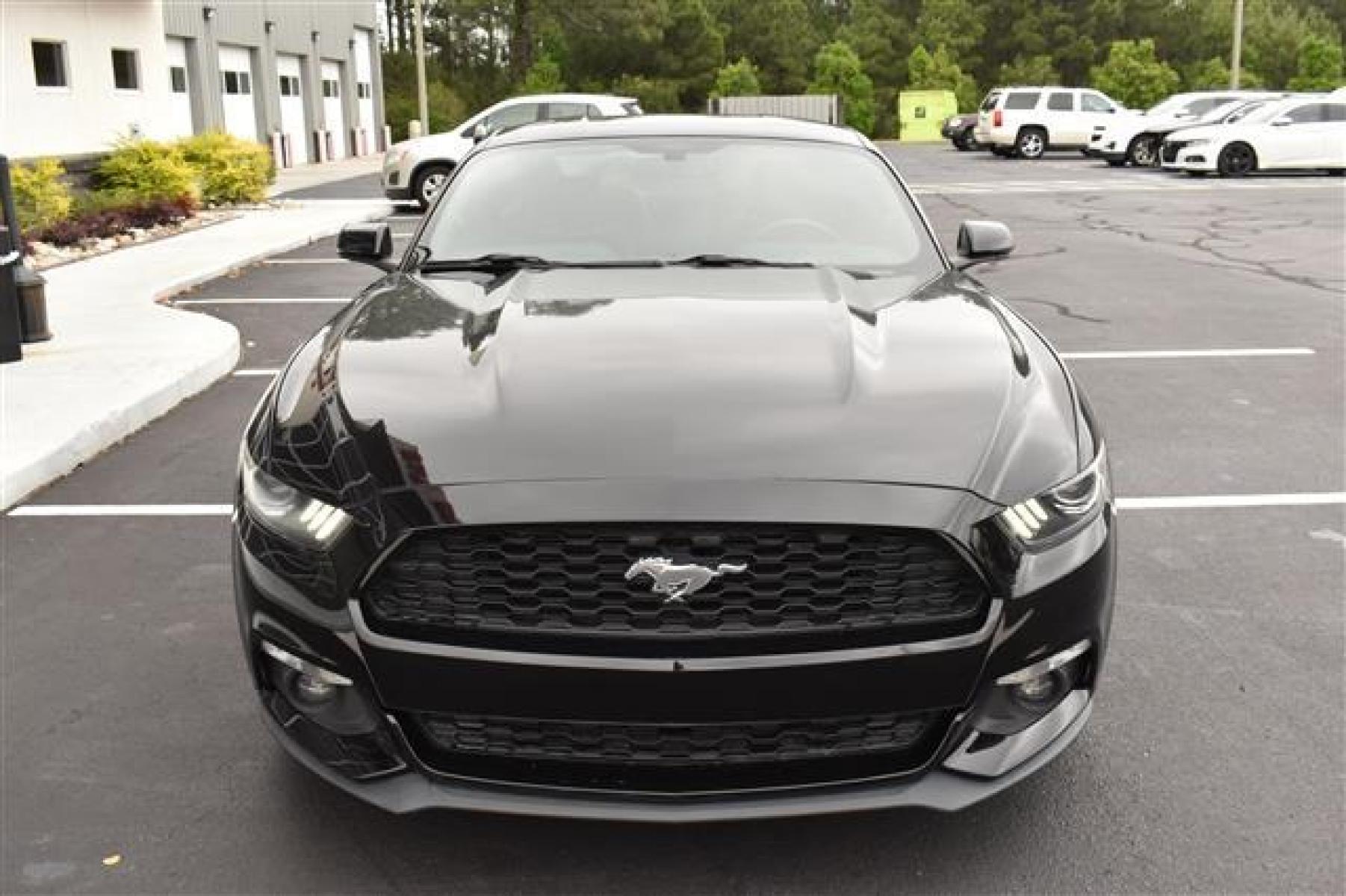 2015 Black Ford Mustang EcoBoost Premium Coupe (1FA6P8TH9F5) , 6-Speed Automatic transmission, located at 3900 Bragg Blvd., Fayetteville, NC, 28303, (910) 868-3000, 35.081905, -78.943367 - T-9527 - 2015 Ford Mustang 1FA6P8TH9F5418581 - Photo #2