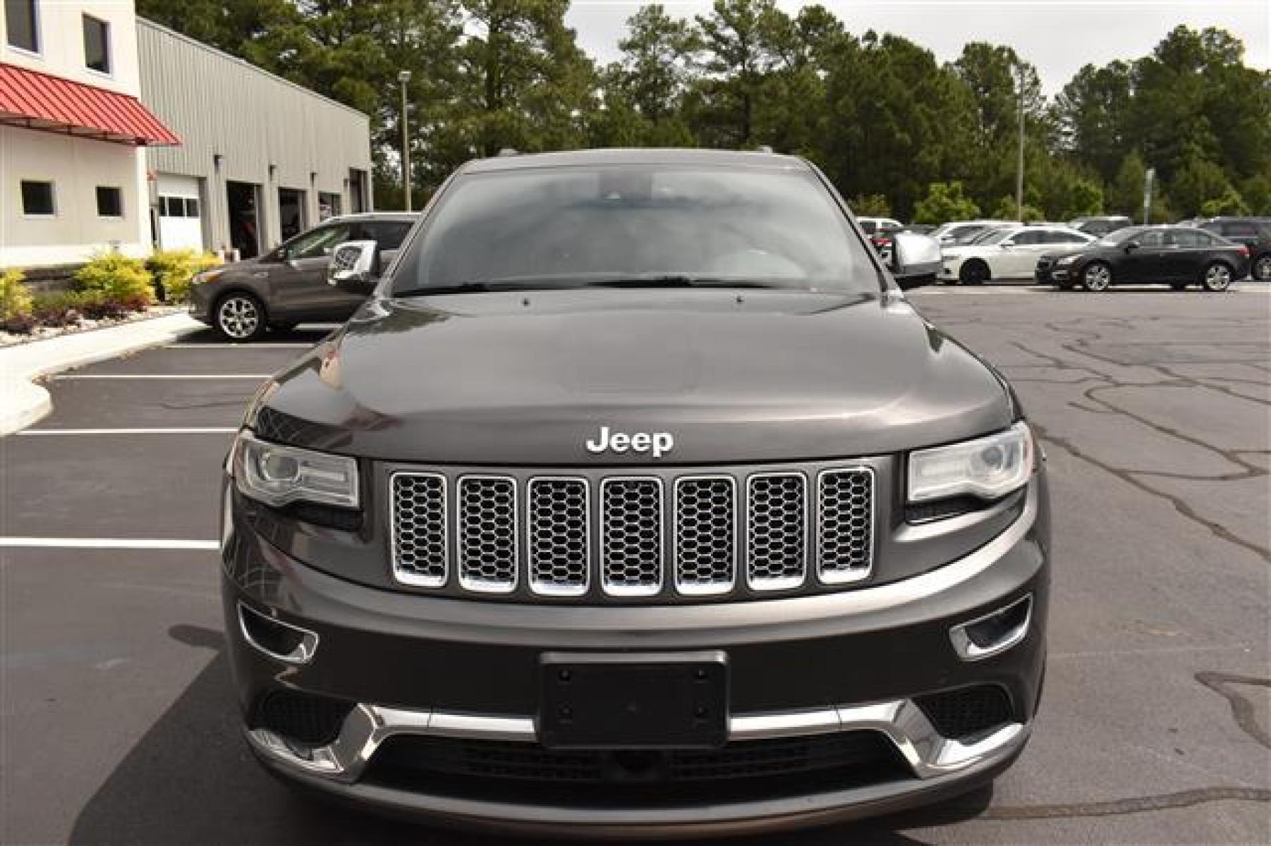 2014 Black Jeep Grand Cherokee Summit 4WD (1C4RJFJG0EC) , 5-Speed Automatic transmission, located at 3900 Bragg Blvd., Fayetteville, NC, 28303, (910) 868-3000, 35.081905, -78.943367 - Photo #2